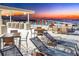 Rooftop terrace with lounge furniture and city views at 111 Golden Gate Pt # 201, Sarasota, FL 34236