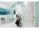 Modern bathroom with walk-in shower and marble finishes at 1155 N Gulfstream Ave # 208, Sarasota, FL 34236