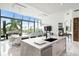 Modern kitchen with marble countertops and stainless steel appliances at 1155 N Gulfstream Ave # 208, Sarasota, FL 34236