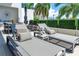 Relaxing patio with lounge chairs and seating area at 1155 N Gulfstream Ave # 208, Sarasota, FL 34236