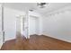 Bright bedroom with wood floors and built-in shelving at 3125 57Th Avenue E Cir, Bradenton, FL 34203