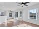 Bright dining area with wood floors and sliding glass doors leading to patio at 3125 57Th Avenue E Cir, Bradenton, FL 34203