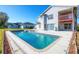 Refreshing blue pool adjacent to the house's back patio at 3125 57Th Avenue E Cir, Bradenton, FL 34203