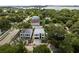 Aerial view of two modern homes under construction near the water at 3464 Camino Real, Sarasota, FL 34239