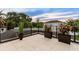 Spacious rooftop deck with modern planters and city views at 3464 Camino Real, Sarasota, FL 34239