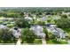 Aerial view of waterfront homes with lush landscaping and private docks at 4532 Shark Dr, Bradenton, FL 34208