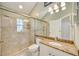 Bathroom with shower, toilet and granite countertop at 4532 Shark Dr, Bradenton, FL 34208