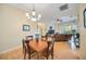 Casual dining area with hardwood floors and chandelier at 4532 Shark Dr, Bradenton, FL 34208