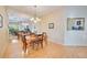 Elegant dining room with hardwood floors and a large mirror at 4532 Shark Dr, Bradenton, FL 34208