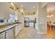 Modern kitchen featuring white cabinets, granite counters, and stainless steel appliances at 4532 Shark Dr, Bradenton, FL 34208