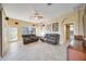 Relaxing living room with leather furniture and tile floors at 4532 Shark Dr, Bradenton, FL 34208