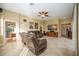 Spacious living room featuring leather recliners and large TV at 4532 Shark Dr, Bradenton, FL 34208