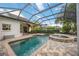 Lovely screened pool and spa with patio area at 4532 Shark Dr, Bradenton, FL 34208