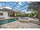 Inviting screened pool and spa with patio area at 4532 Shark Dr, Bradenton, FL 34208