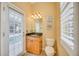 Well-appointed powder room with granite vanity and updated fixtures at 4532 Shark Dr, Bradenton, FL 34208