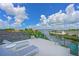 Spacious rooftop terrace with water views and lounge chairs at 4607 5Th Ne Ave, Bradenton, FL 34208