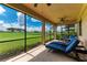 Relax on this screened lanai with views of the golf course at 6708 Grand Estuary Trl # 104, Bradenton, FL 34212