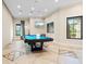 Game room with pool table and seating area at 5308 Morey Farms Loop, Palmetto, FL 34221