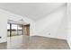 Spacious living area with large windows and water views at 1520 Pelican Point Dr # 251, Sarasota, FL 34231