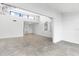 Open concept living area with tile floors and natural light at 1520 Pelican Point Dr # 251, Sarasota, FL 34231
