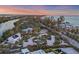 Aerial view of property and surrounding neighborhood at 7665 Sanderling Rd, Sarasota, FL 34242