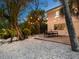 Outdoor patio area with string lights and seating at 7665 Sanderling Rd, Sarasota, FL 34242