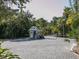 Gated entrance to a private community at 7665 Sanderling Rd, Sarasota, FL 34242