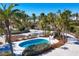 Elevated view of kidney-shaped pool with beach access at 7665 Sanderling Rd, Sarasota, FL 34242