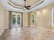Main bedroom with french doors opening to the pool at 12313 Baypointe Ter, Cortez, FL 34215