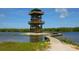 Wooden observation tower with boardwalk access at 12313 Baypointe Ter, Cortez, FL 34215