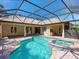 Large screened pool and spa area at 12313 Baypointe Ter, Cortez, FL 34215