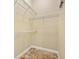 Walk-in closet with ample shelving and hanging space at 12313 Baypointe Ter, Cortez, FL 34215