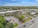 Aerial view of shopping center with diverse stores and parking at 5680 Blount Ave, Sarasota, FL 34231