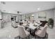 Open concept dining area with marble floors and view to living room at 5680 Blount Ave, Sarasota, FL 34231