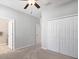 Spacious bedroom with double doors to bathroom and large closet at 14573 Ponce De Leon Trl, Port Charlotte, FL 33981