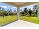 Covered patio overlooking a spacious backyard at 1702 Rada Ln, North Port, FL 34288