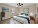 Serene bedroom with teal bedding and wood nightstands at 2806 67Th W St, Bradenton, FL 34209