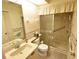 Bathroom with walk-in shower and single sink vanity at 3154 Windrush Bourne # 23, Sarasota, FL 34235