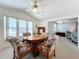 Dining area with wooden table and chairs near kitchen at 3333 26Th E Ave # 1230, Bradenton, FL 34208