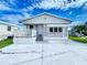 Single story home with a quaint front porch, white trim, and a well-maintained front yard at 3333 26Th E Ave # 1230, Bradenton, FL 34208