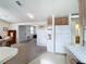 Kitchen features white appliances and ample cabinetry at 3333 26Th E Ave # 1230, Bradenton, FL 34208