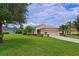 Single story home with a well maintained lawn at 12271 Lavender Loop, Bradenton, FL 34212