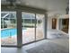 Inviting pool and patio area, accessed through sliding glass doors at 5050 Kestral Park S Way, Sarasota, FL 34231