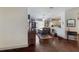 Charming dining area with dark hardwood floors and rustic table at 2407 Waterford Ct, Palmetto, FL 34221