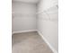 Spacious walk-in closet with wire shelving at 5557 Rosette Rd, North Port, FL 34288