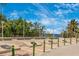 Riverside Veteran's memorial showcasing flags, monument, and seating area with tranquil water views at 929 Suncrest Ln, Englewood, FL 34223