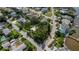 Aerial view of residential lot, surrounded by lush trees at 2403 Palma Sola Blvd, Bradenton, FL 34209