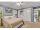 Bright bedroom with a king-size bed and built in closet at 2403 Palma Sola Blvd, Bradenton, FL 34209