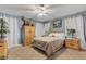 Serene bedroom featuring neutral tones, a comfortable bed and abundant natural light at 2403 Palma Sola Blvd, Bradenton, FL 34209