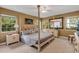 Spacious main bedroom with a large bed, ample natural light, and built-in cabinetry at 2403 Palma Sola Blvd, Bradenton, FL 34209